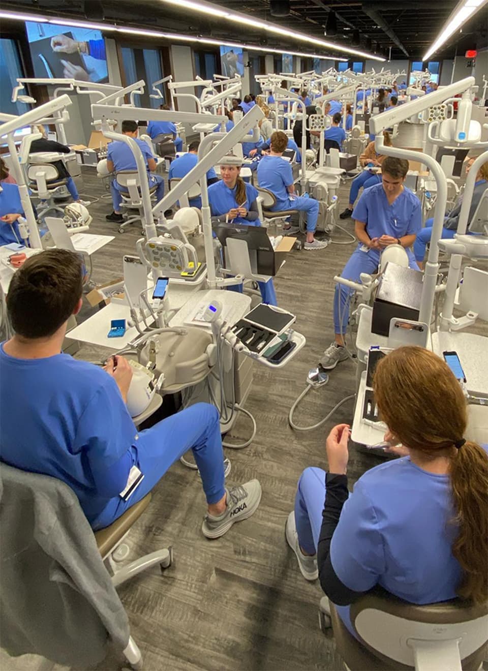 dental students in lab learning techniques