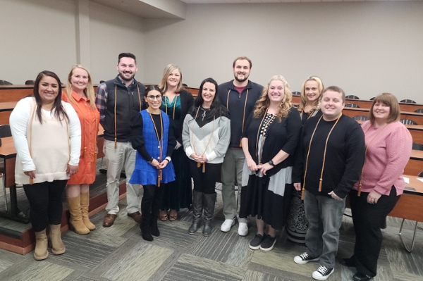 group photo from cording ceremony