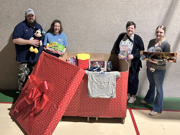 LMU representatives delivering toys