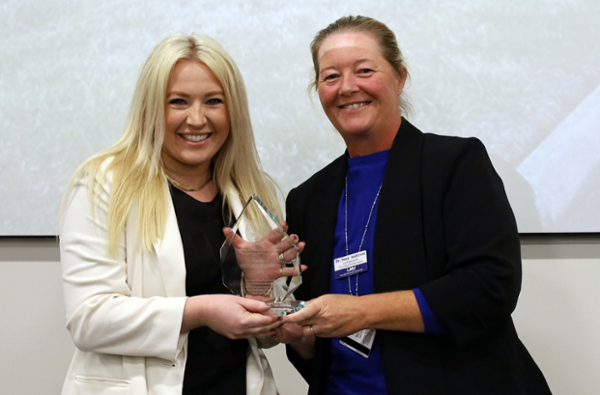 Shamblin getting award from Dean Anderson